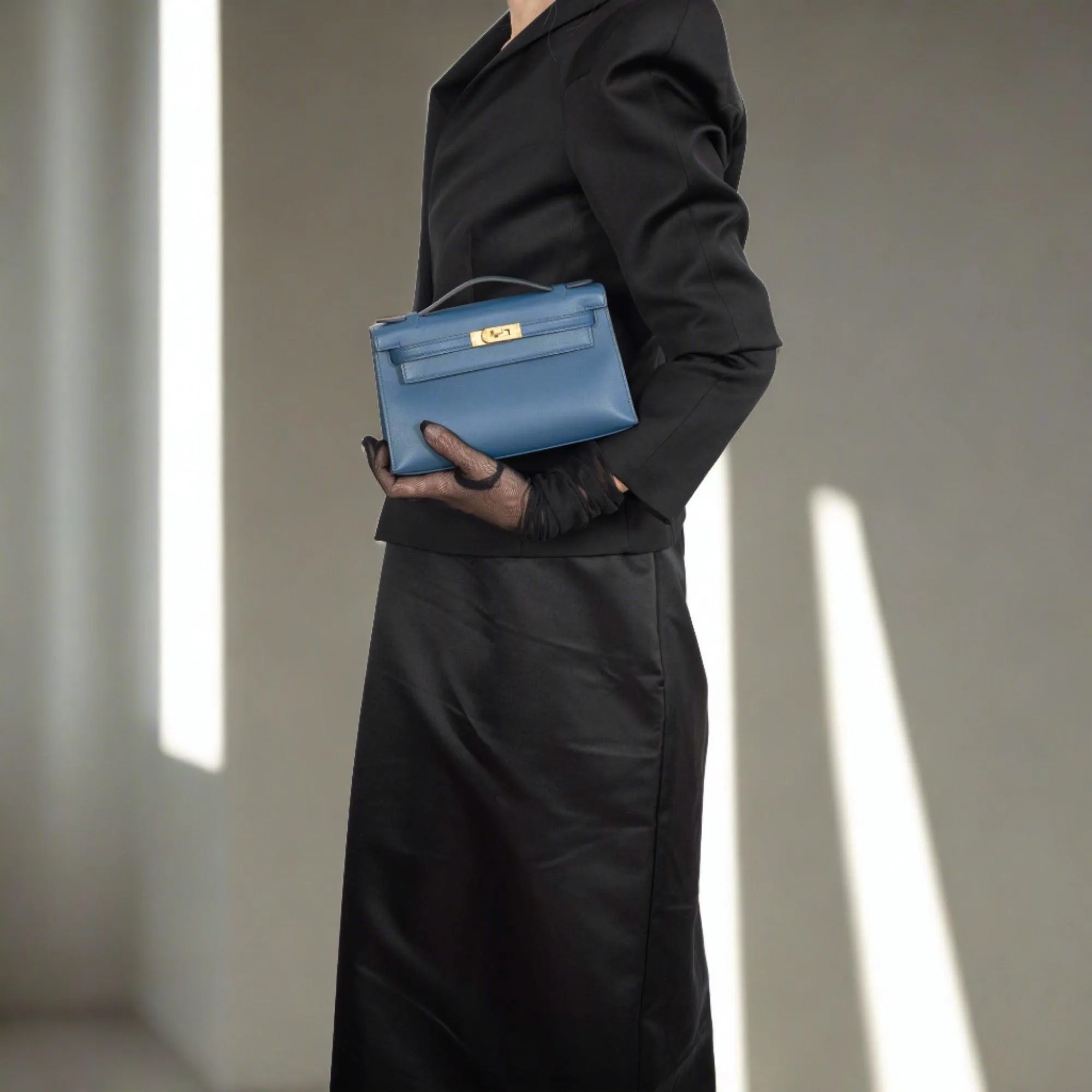 Hermès Kelly Pochette Navy Swift with Gold Hardware