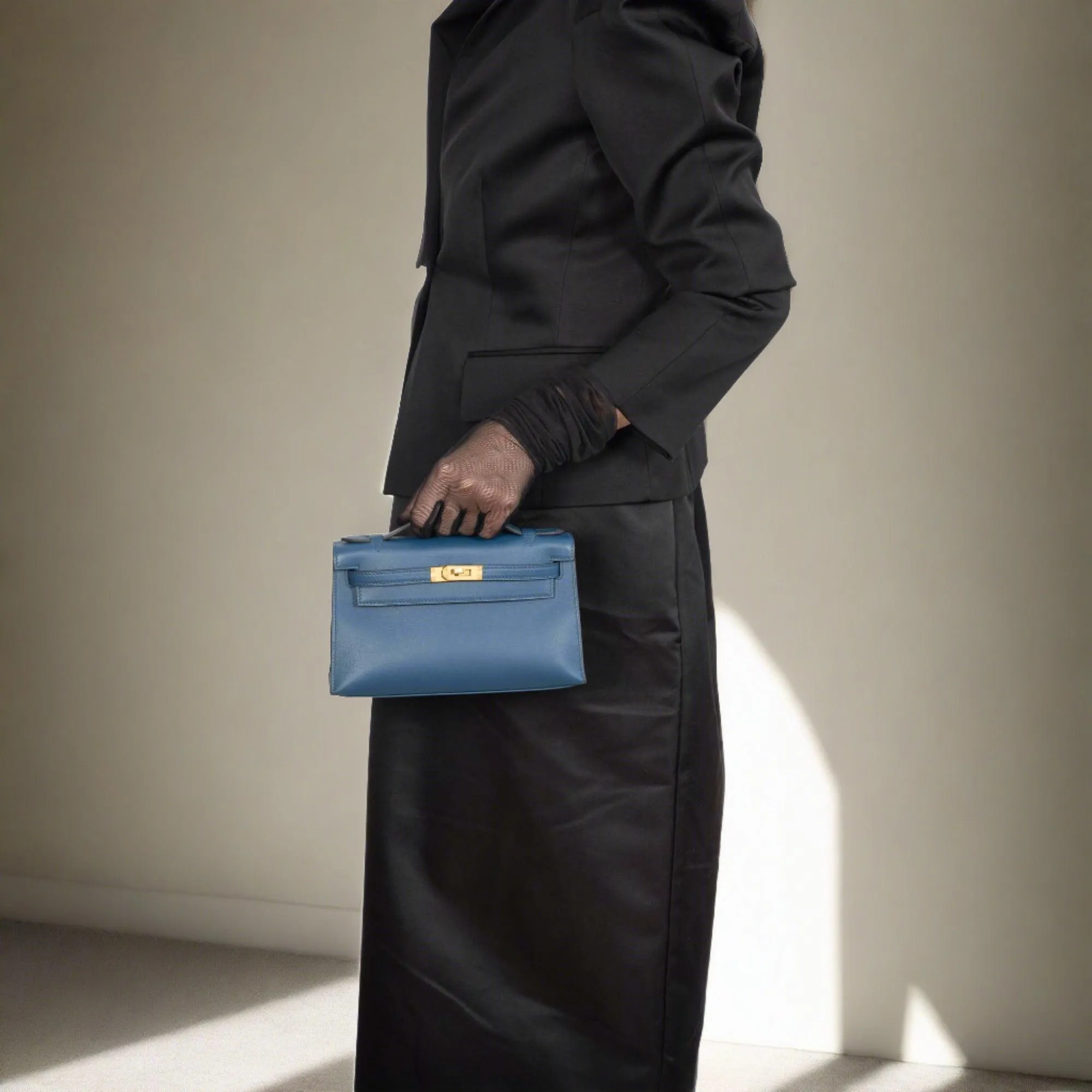 Hermès Kelly Pochette Navy Swift with Gold Hardware